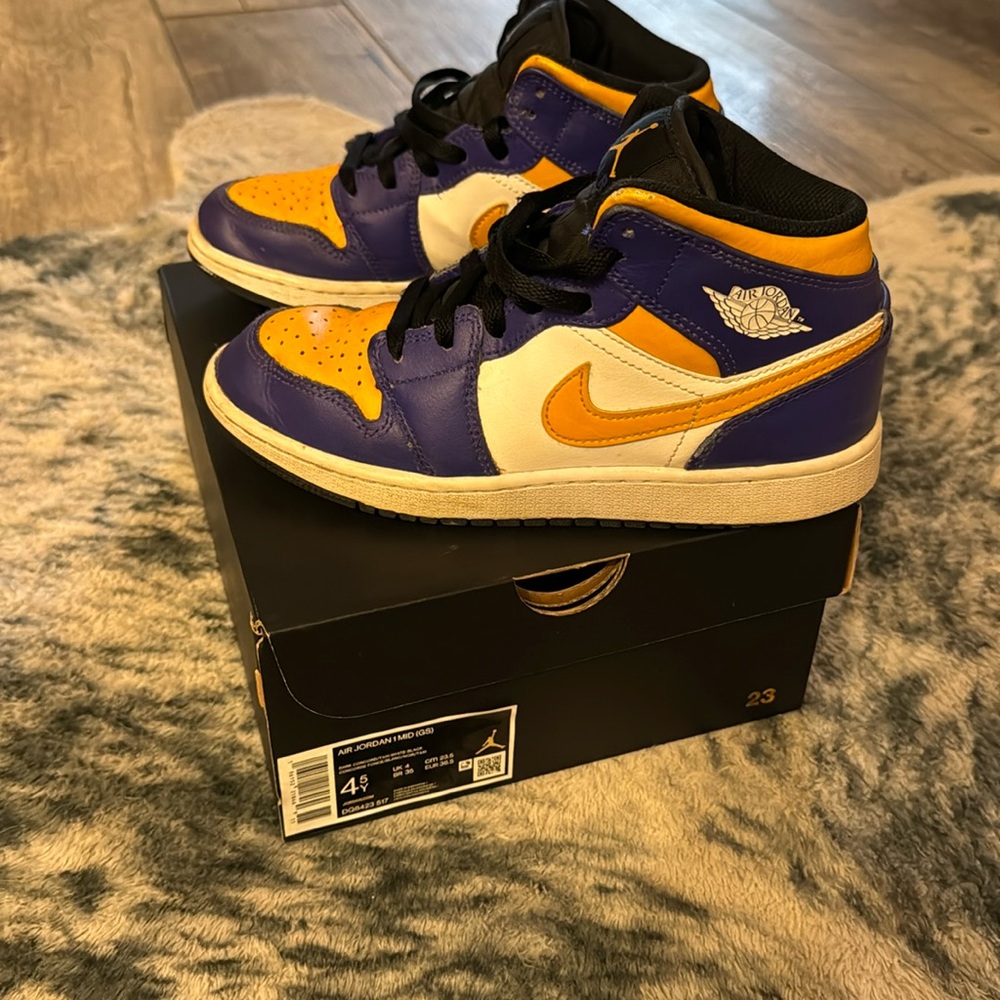 White, black, purple, and yellow air, Jordans size 4 1/2.